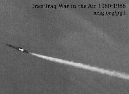 The second stage of an Iraqi SA-2 �telephone pole� passes harmlessly in front of an Iranian RF-4E, which captured this hair-raising moment. (Authors� collection)